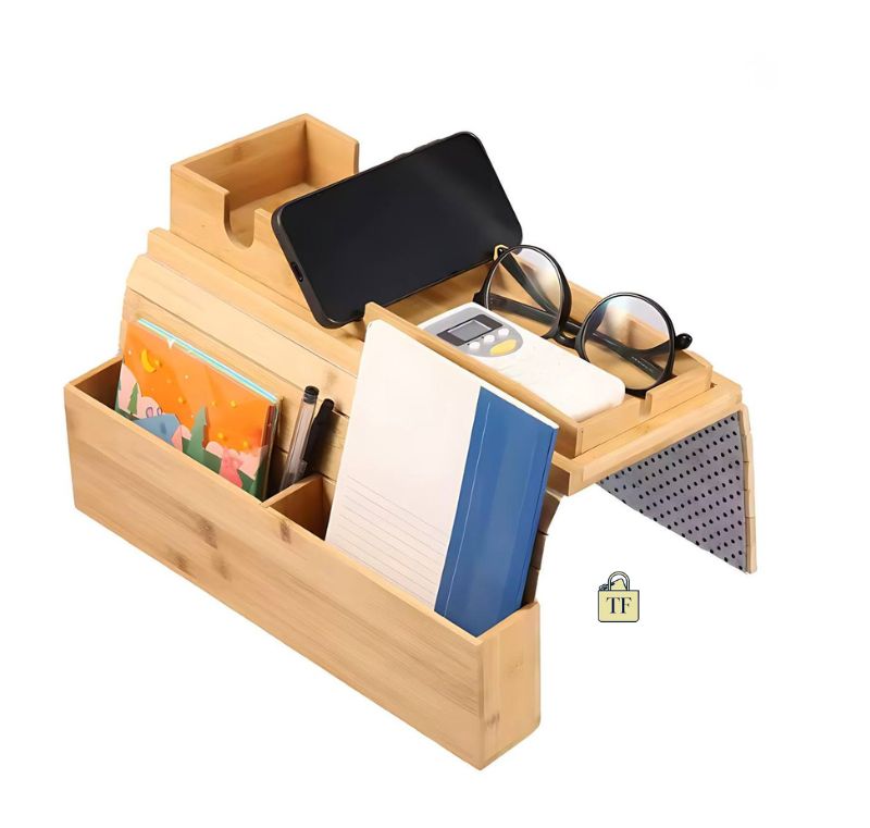 Wooden desk organizer with phone, glasses, and books on a white background