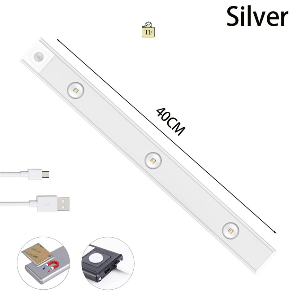 Silver LED strip light with USB cable and motion sensor on a white background  40 cm