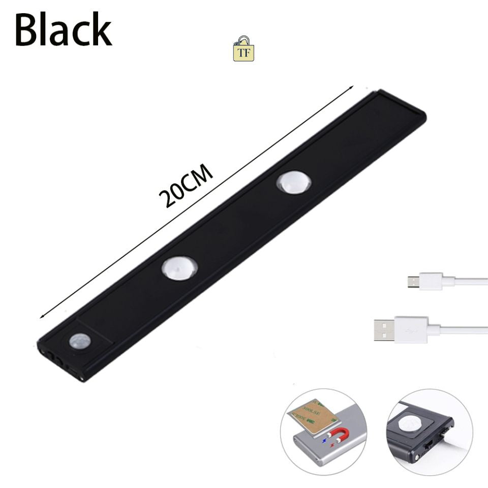Black LED strip light with USB cable on a white background